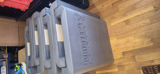 Protecht Hoist Pads — stacked inventory with PRO-TECHT branding